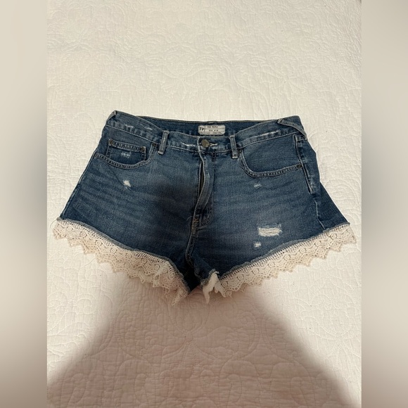 Free People size 30 jean shorts trimmed with lace - Picture 1 of 3